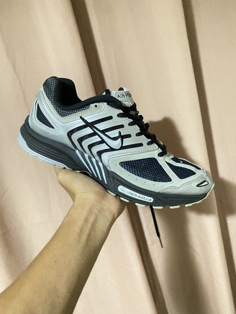 Nike P-6000 silver black (Category: Sneakers) located in Barobo. Submitted by sonogonggr22560 (Listing ID 1464781449, Image 1). Description: - Colorway: Silver and Black - Material: Mesh upper with synthetic overlays - Features: Cushioned midsole with full-length Nike Air tech, black laces, dark grey outsole - Style: Classic retro runner - Condition: Clean pair, minimal wear on the soles.
