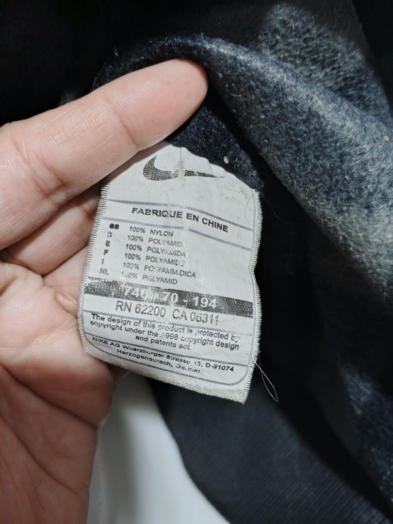 NIKE PUFFER JACKET VINTAGE 90S (Category: Coats, Jackets and Outerwear) located in Bulacan. Submitted by annenicathriftthriftlang (Listing ID 1464887895, Image 3). Description: VINTAGE 90s NIKE PUFFER JACKET 💎🔥 COLLECTORS ITEM - 1998 TAG PA! ✅ Legit / Original Vintage Nike - Grey Tag ✅ Size: XXL on Tag - Fits L-XXL (26W x 29L est.) ✅ Condition: 8/10 - Very Good for vintage ✅ Details: Embroidered Nike Blue Logo, Fleece lining, Full zip, Ribbed c