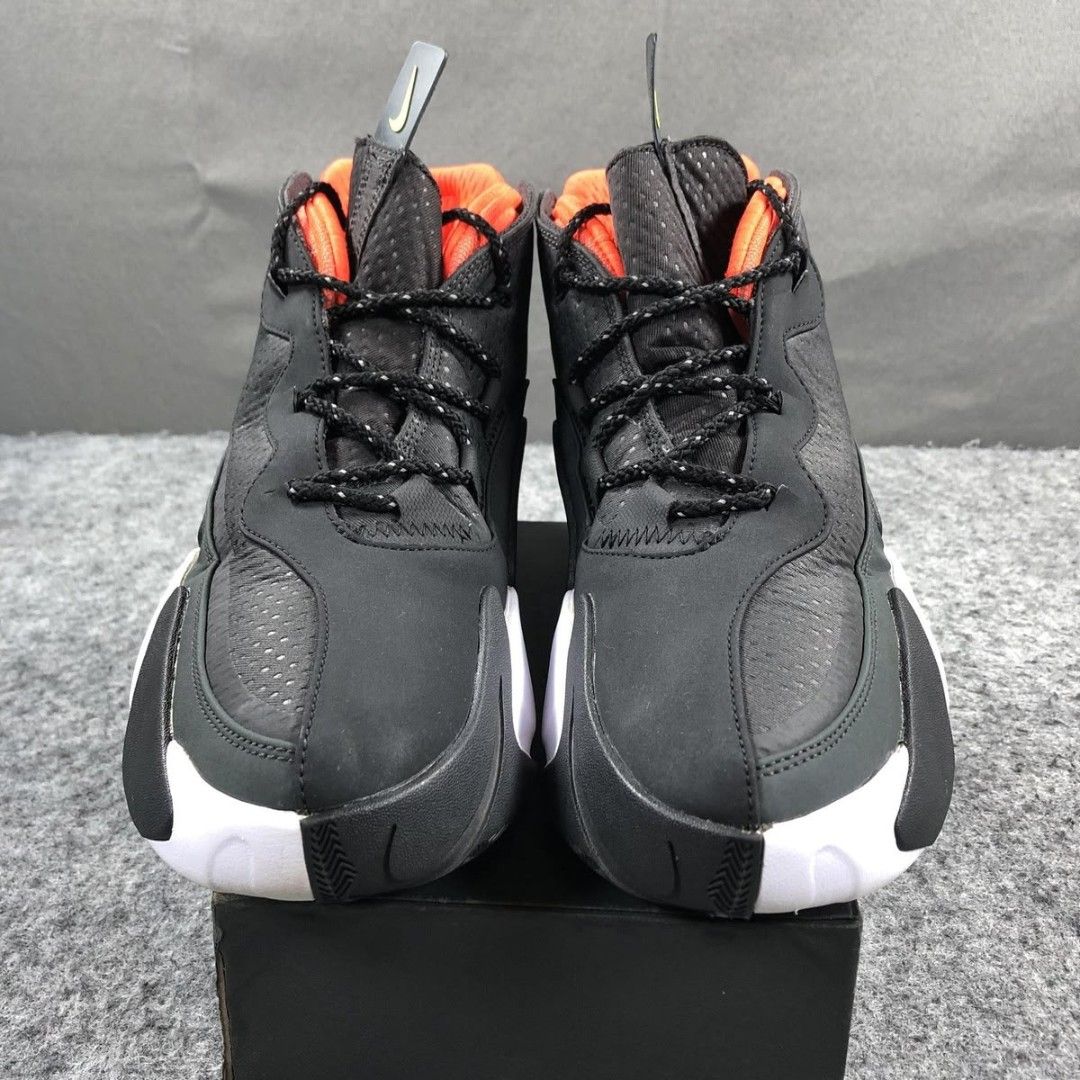 Nike ReactNike react frenzy Size Us 10 (Category: Sneakers) located in Mandaluyong City. Submitted by bethco (Listing ID 1464833359, Image 1). Description: - Brand: Nike - Model: React Vision - Colorway: Black with neon yellow swooshes and bright orange interior lining - Sole: Chunky white and black foam sole with unique organic shapes - Features: Dark textured mesh, synthetic overlays, tongue/heel pull loops, and reflective markings - Inclusions