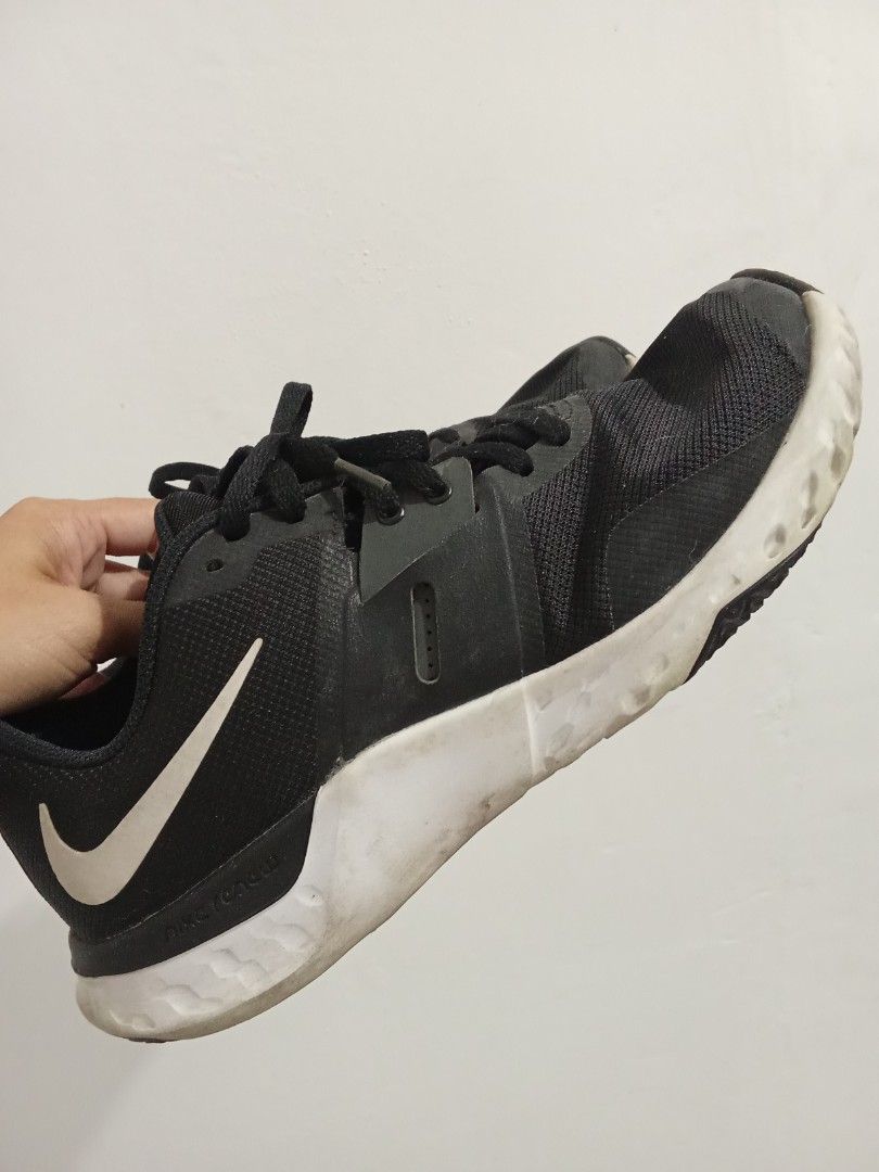 Nike Renew Black Athletic Sneakers (Category: Sneakers) located in Quezon City. Submitted by jane019 (Listing ID 1464916124, Image 2). Description: - Brand: Nike Renew - Color: Black with white soles - Material: Breathable mesh upper - Comfort: Cushioned foam sole for solid support during runs and workouts - Fit: Secure lace-up closure - Condition: Good structural condition with great grip on bottom treads; minor dirt on soles from previous wear 