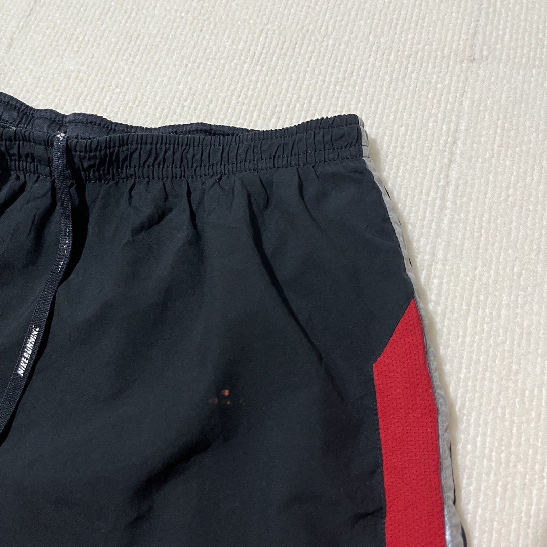 running shorts nike (Category: Activewear) located in Malay. Submitted by oplt_dept. (Listing ID 1464868697, Image 3). Description: -exellent condition -running essentials -waist:30-36 -length:15 -leg opening:13.5 -made in vietnam.