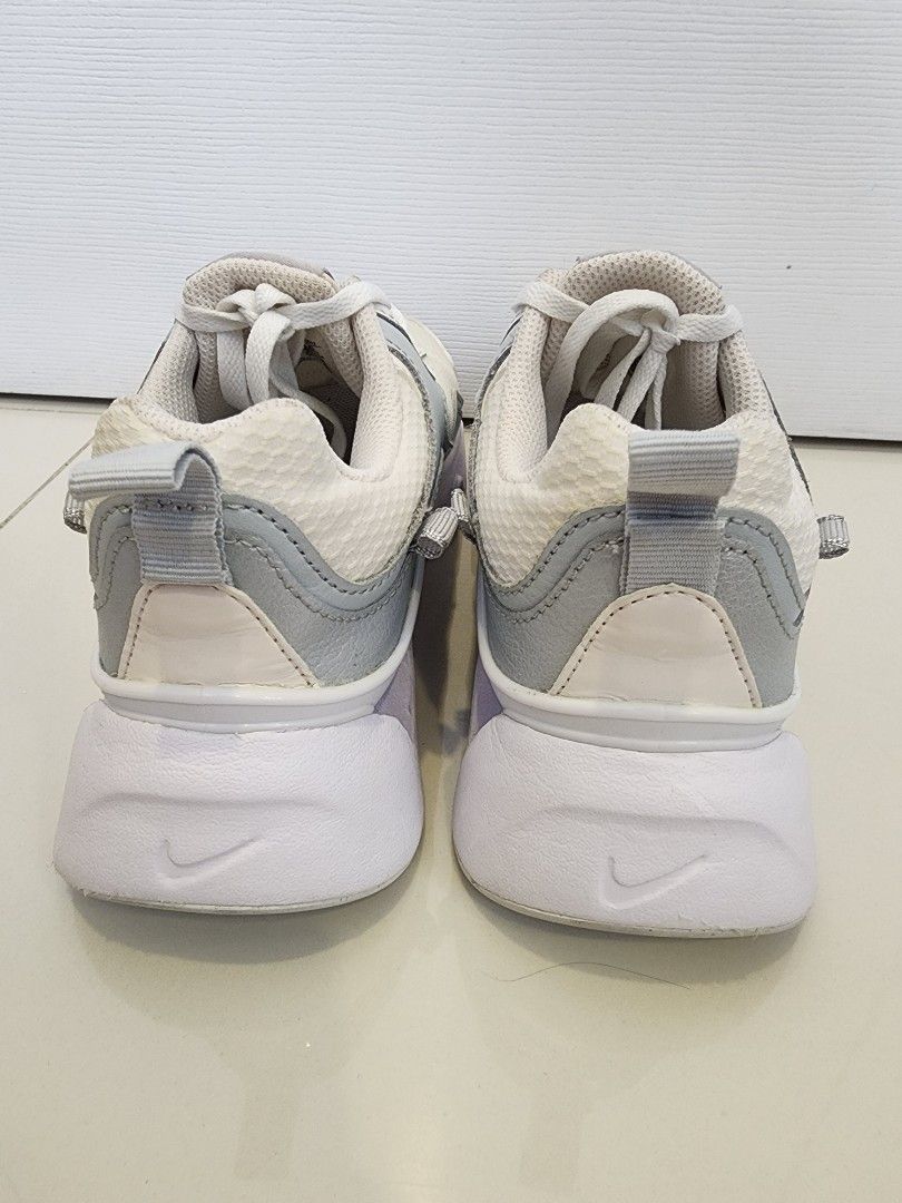 Nike RYZ 365 II Size 7 (Category: Sneakers) located in Quezon City. Submitted by pinkyshang (Listing ID 1464825986, Image 3). Description: - Brand/Model: Nike RYZ 365 II - Design: Chunky wavy soles with a breathable mesh upper - Features: Lace-up front with branded lace locks and heel pull tabs for easy wearing - Comfort: Fitted with comfort insoles - Condition: Uppers are still clean, minor dirt on outsoles from light wear - Bought this for 4,30