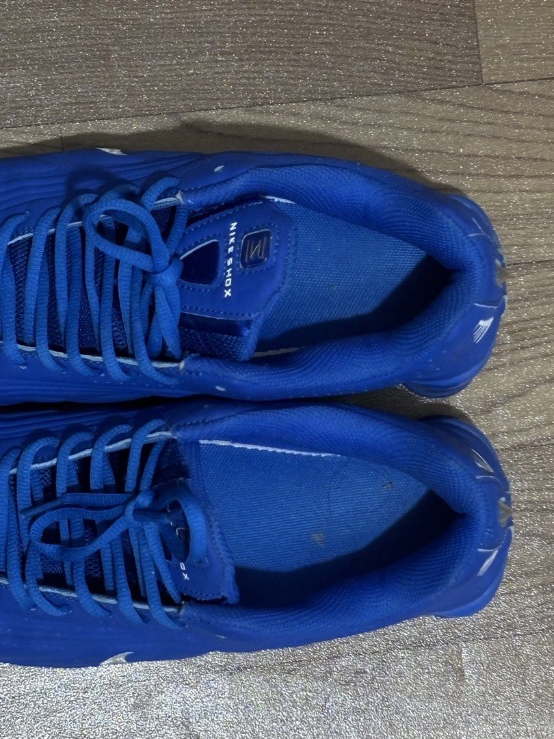 Nike Shox Racer Blue (Category: Sneakers) located in Tarlac. Submitted by declutterbyyvo (Listing ID 1464811648, Image 3). Description: - Brand: Nike Shox - Colorway: Bold royal blue with metallic silver Swoosh and white contrast stitching - Cushioning: Classic heel pill cushioning units for maximum comfort - Material: Breathable mesh toe box and clean laces/tongues - Condition: Good, well-maintained - Style: Standout statement piece on feet.
