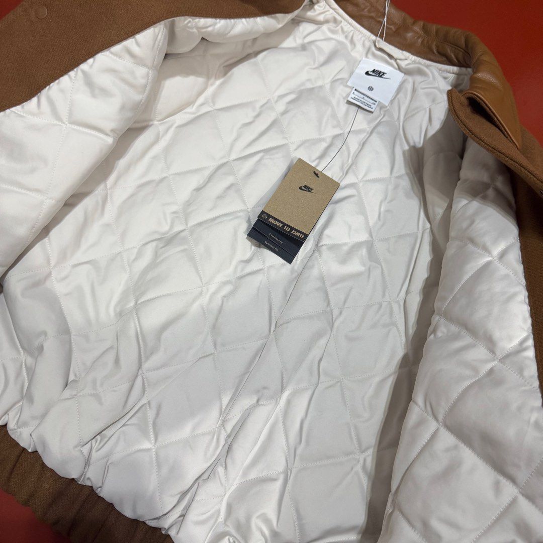 NIKE SOLO SWOOSH WOOL VARSITY JACKET (Category: Coats, Jackets and Outerwear) located in Pasig City. Submitted by buzzthrifty (Listing ID 1464890197, Image 3). Description: OVERSIZED FITTINGS SIZE AVAILABLE SMALL 23-24x25 MEDIUM 24-25x26 LARGE 25-26x27 BRANDNEW WITH TAGS .