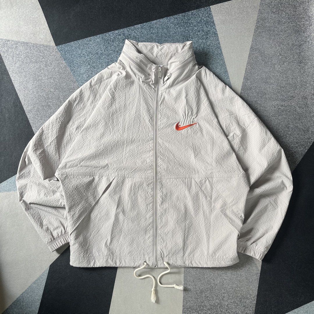 Nike Sportswear Woven Jacket (Category: Coats, Jackets and Outerwear) located in Paranaque City. Submitted by mackraven260159 (Listing ID 1464886437, Image 1). Description: 24 x 26 Boxy Fit Medium Can Fit to Large Packable Hoodie Adjustable Hem Embroidered Details In Front & Back..