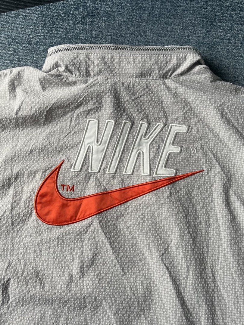 Nike Sportswear Woven Jacket (Category: Coats, Jackets and Outerwear) located in Paranaque City. Submitted by mackraven260159 (Listing ID 1464886437, Image 3). Description: 24 x 26 Boxy Fit Medium Can Fit to Large Packable Hoodie Adjustable Hem Embroidered Details In Front & Back..