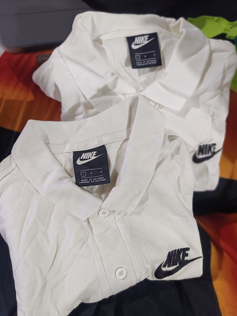 Nike white polo Large (Category: Tshirts & Polo Shirts ) located in Cebu City. Submitted by negotiableprice22 (Listing ID 1464815230, Image 1). Description: Nike large 2 pieces legit both made in Vietnam dimes 20.5x29 21.5x30 large and small logo available price negotiable.