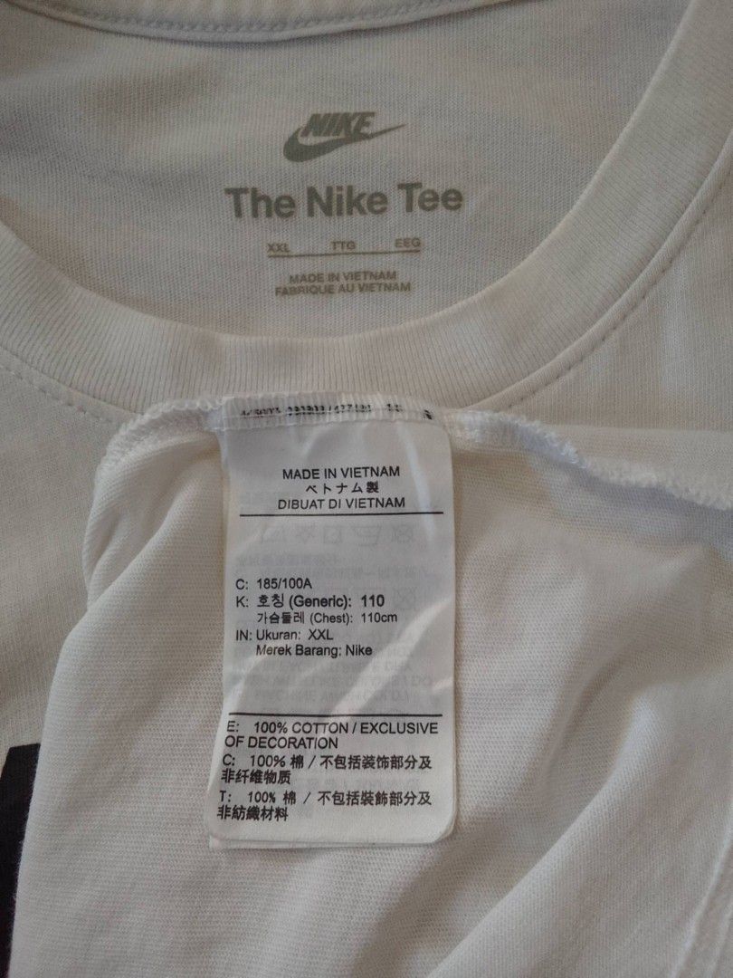 Nike White T-Shirt XL (Category: Tshirts & Polo Shirts ) located in Zamboanga. Submitted by nurbya898048 (Listing ID 1464925390, Image 3). Description: Classic white Nike tee featuring the iconic black logo across the chest. Size XXL, regular fit with short sleeves and a crew neck. Made in Vietnam from 100 percent cotton. Clean fabric, clear print graphics, and tag labels intact. Great staple piece for casual everyday wear. Size fit to extra larg