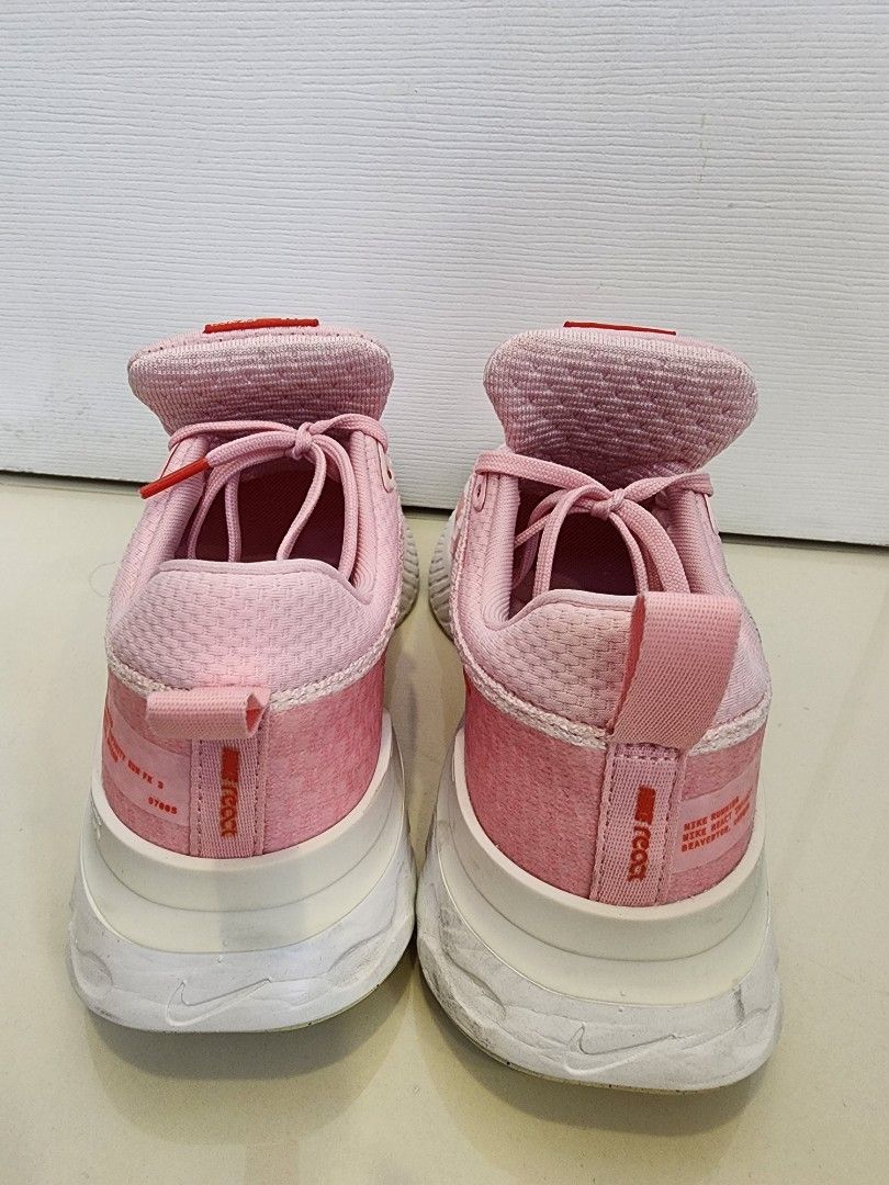 Nike Women's React Infinity Run Flyknit 3 Size 7.5 (Category: Sneakers) located in Quezon City. Submitted by pinkyshang (Listing ID 1464865918, Image 3). Description: - Brand/Model: Nike Women's React Infinity Run Flyknit 3 Size 7.5 - Colorway: Pink with striking Red Swoosh and Red Tongue Label - Sole: Cushioned White and Grey React foam with light wear on bottom tread - Upper: Breathable knit material with matching Pink laces and padded collar -
