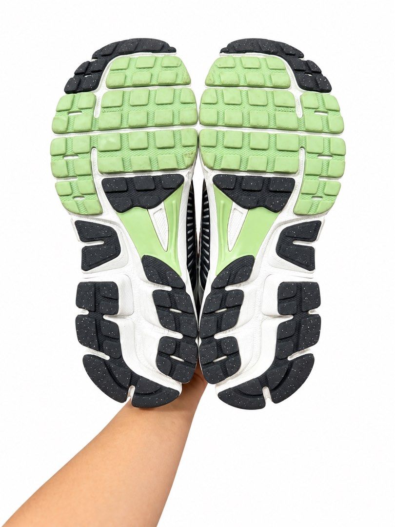 Nike Zoom Vomero 5 Grey Green (Category: Sneakers) located in Valenzuela. Submitted by boutiquechic (Listing ID 1464842534, Image 3). Description: - Model: Nike Zoom Vomero 5 - Colorway: Grey with fresh light green accents - Upper: Breathable mesh with stylish heel cage details - Comfort: Cushioned soles equipped with traction pods - Extra Features: Reflective details along the laces and tongue branding - Condition: Brand new / pristine condition