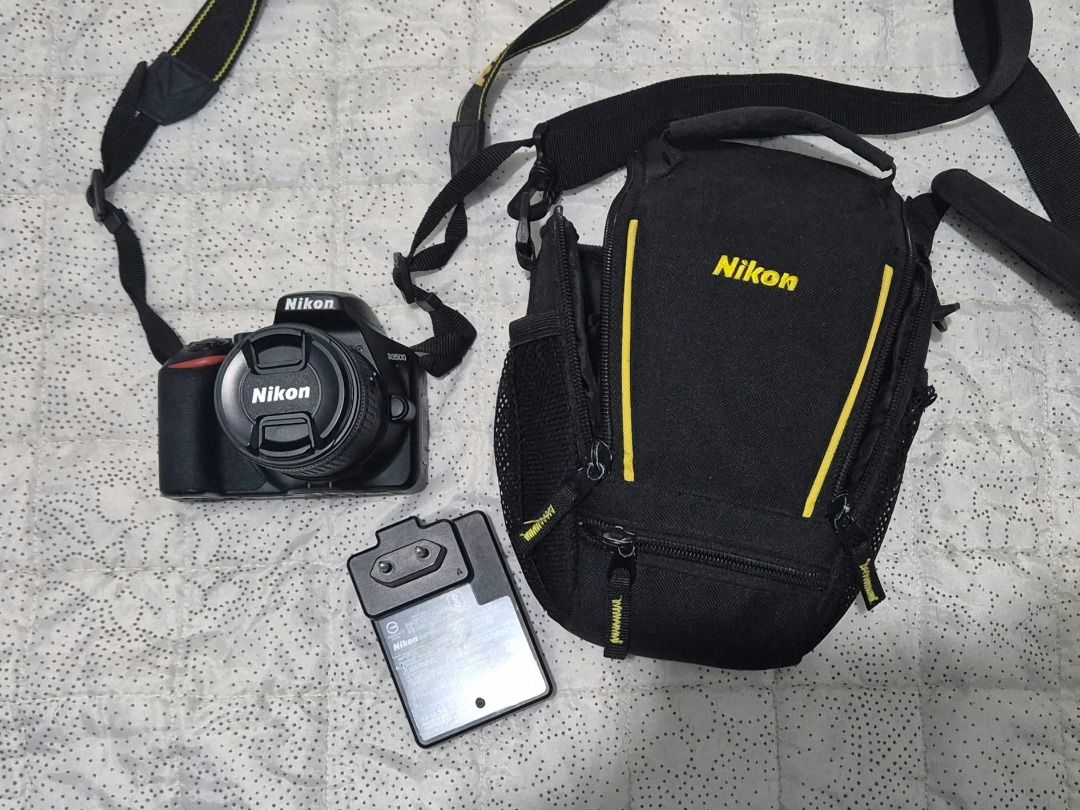 Nikon D3500 DSLR Camera with All-In Kit (Category: Cameras) located in Caloocan City. Submitted by jinniegenie (Listing ID 1464967451, Image 2). Description: Nikon D3500 DSLR Camera Setup Inclusions: Camera Body AF-P Nikkor 18-55mm Lens (1:3.5-5.6G) Camera Bag with Sling 16GB SD Card Battery and Charger Comes with original box, info, manual, etc. Camera Tripod (Not in photos but included in the kit) Shutter Count: 14148 Only used during travel an