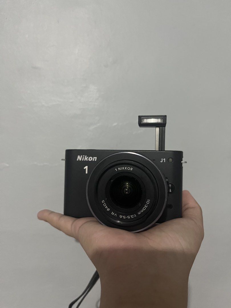 Nikon J1 (Category: Cameras) located in Manila. Submitted by milamartina123 (Listing ID 1464799059, Image 1). Description: Nikon J1 Mirrorless - all buttons are working - zoom in and zoom out are working without lens dust - ready to use! (w/ sd card, battery, lens, and charger) only issue is yung sa screen (check photo) tondo, manila loc can meet up nearby no return/refund once settled.