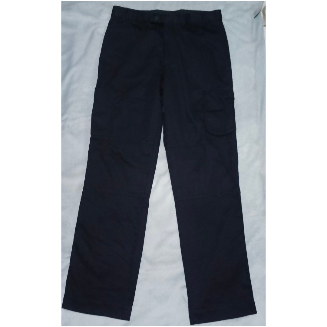 NNT Dark Navy/Black Cargo Work Pants #552 (Category: Trousers) located in Santa Cruz. Submitted by gie_thrift_shop (Listing ID 1464900330, Image 2). Description: NNT Dark Navy/Black Cargo Work Pants Color: Dark Navy / Black Size: 82R (approx. 32-33 inches waist) Length: 41 inches Pockets: 7 Pockets total (2 side slant pockets, 2 back pockets, 1 side flap cargo pocket) Condition: Pre-loved with minor signs of usage (well-maintained, minimal fabric