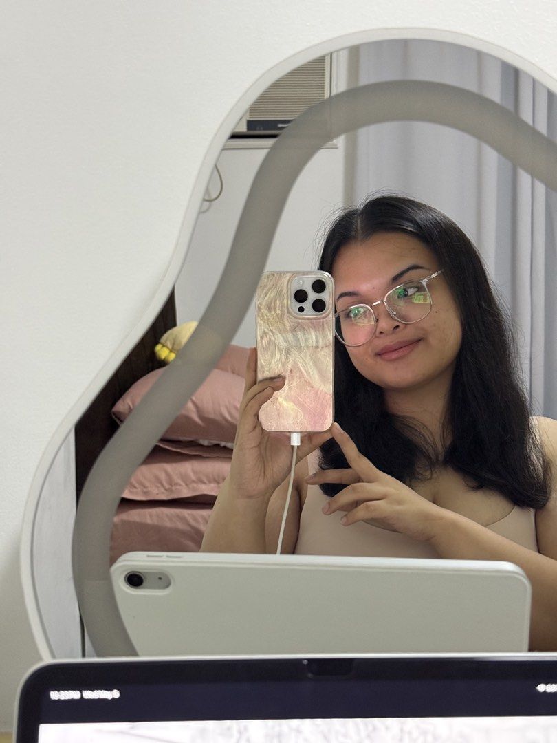 Nordic style LED vanity makeup mirror with white base (Category: Mirrors) located in Imus. Submitted by neirasalonga_ (Listing ID 1464787312, Image 2). Description: - Wavy asymmetrical design - Built-in LED lighting with convenient touch power button on the base - Sturdy white stand for tabletops - Standard plug-in cable included - Perfect aesthetic upgrade for your makeup desk or dresser setup RFS: Decluttering 📍Imus, Cavite DELIVERY: via Lalam