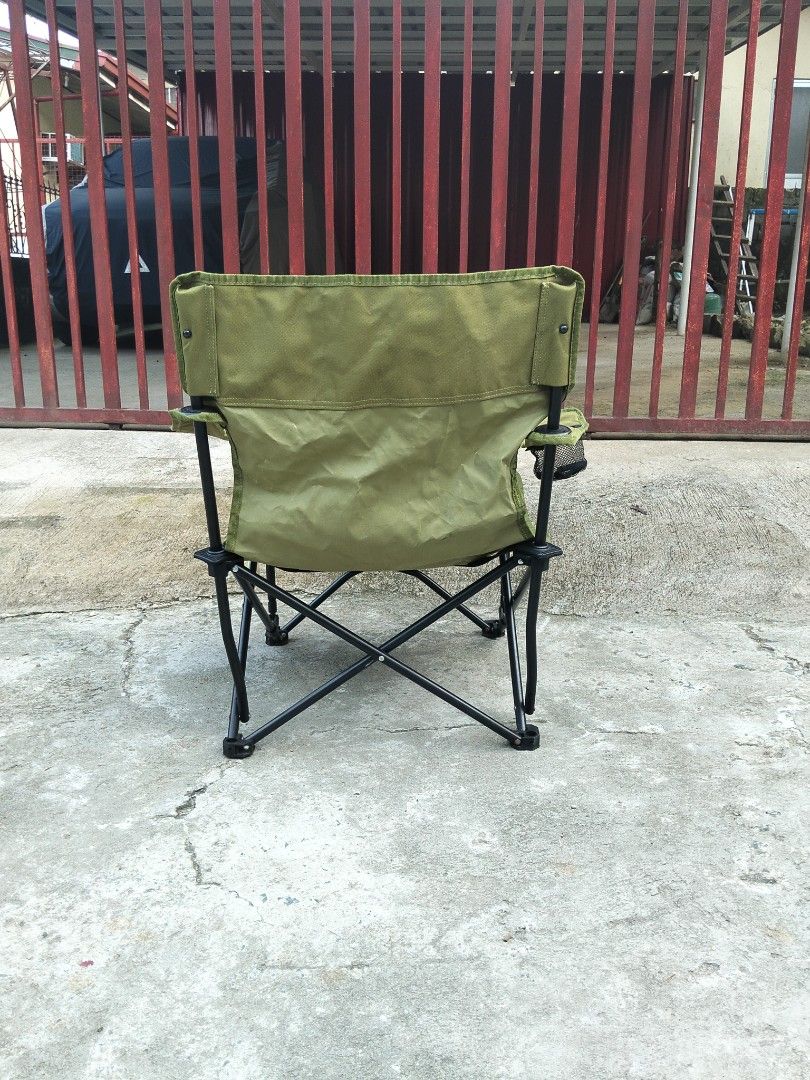 North Eagle Foldable Camping Chair Green (Category: Hiking & Camping) located in Abucay. Submitted by cristineca20489 (Listing ID 1464953014, Image 3). Description: - Brand: North Eagle - Color: Green with black metal frame - Features: Built-in mesh cup holder on the right armrest - Design: Sturdy X-frame base for added stability and durable fabric seat/backrest - Portability: Folds up compactly for easy transport and storage - Ideal for: Camping