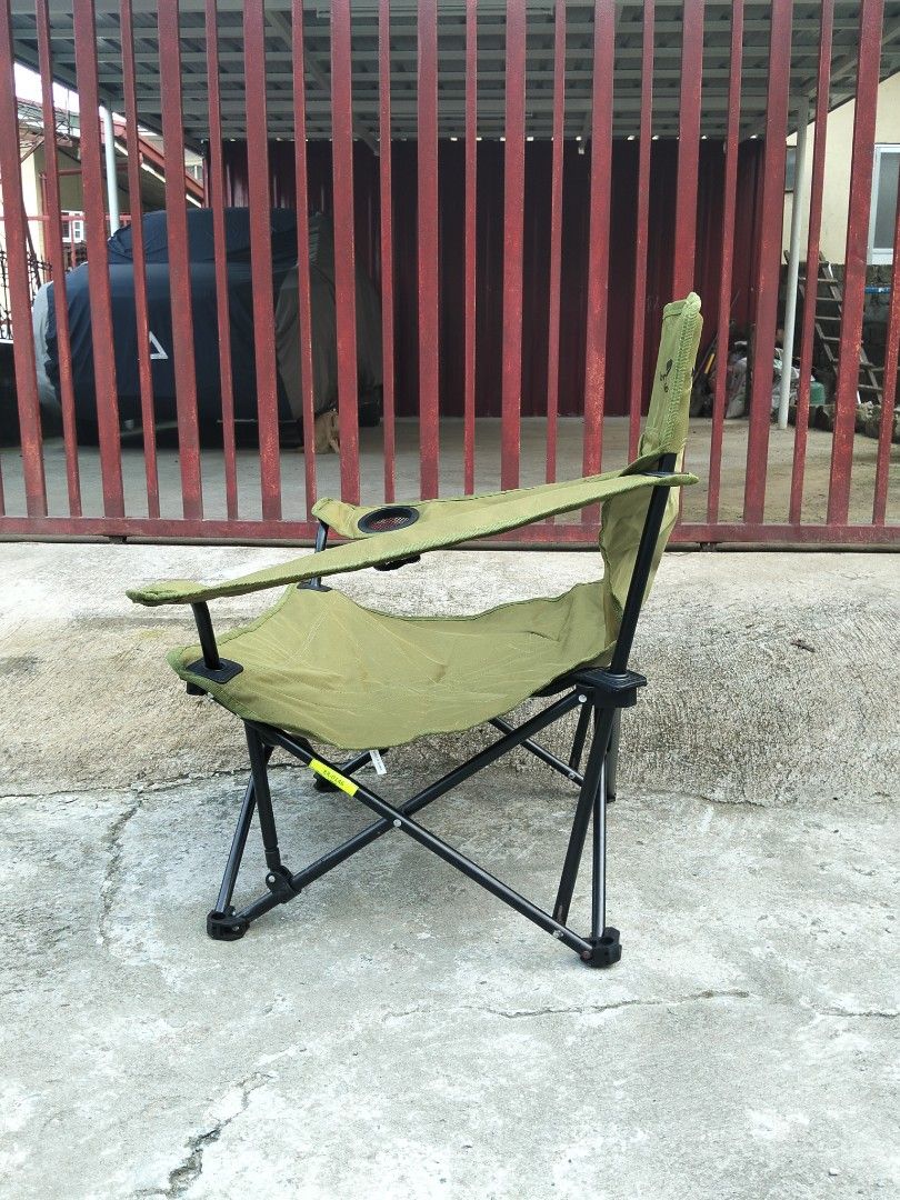 North Eagle Foldable Camping Chair Green (Category: Hiking & Camping) located in Abucay. Submitted by cristineca20489 (Listing ID 1464953014, Image 2). Description: - Brand: North Eagle - Color: Green with black metal frame - Features: Built-in mesh cup holder on the right armrest - Design: Sturdy X-frame base for added stability and durable fabric seat/backrest - Portability: Folds up compactly for easy transport and storage - Ideal for: Camping
