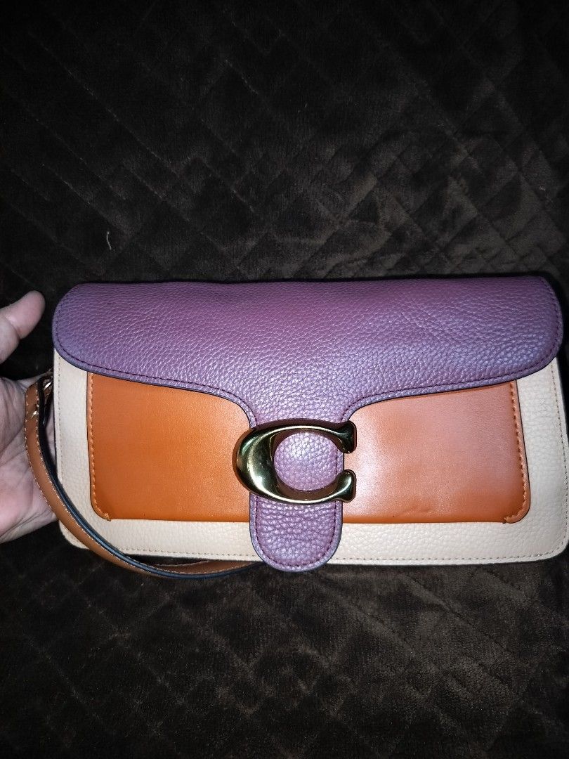 OG Coach tabby 26 (Category: Shoulder Bags) located in Caloocan City. Submitted by jennielz (Listing ID 1464870091, Image 1). Description: authentic Coach Tabby 26 -colorblock leather -YKK zip -Made in Vietnam - rubberlinings intact -no cracking -replaced sling -clean interior -minimal signs og usage -please see pics for details over all the bag is in good condition no lowballer pls. ☺️.
