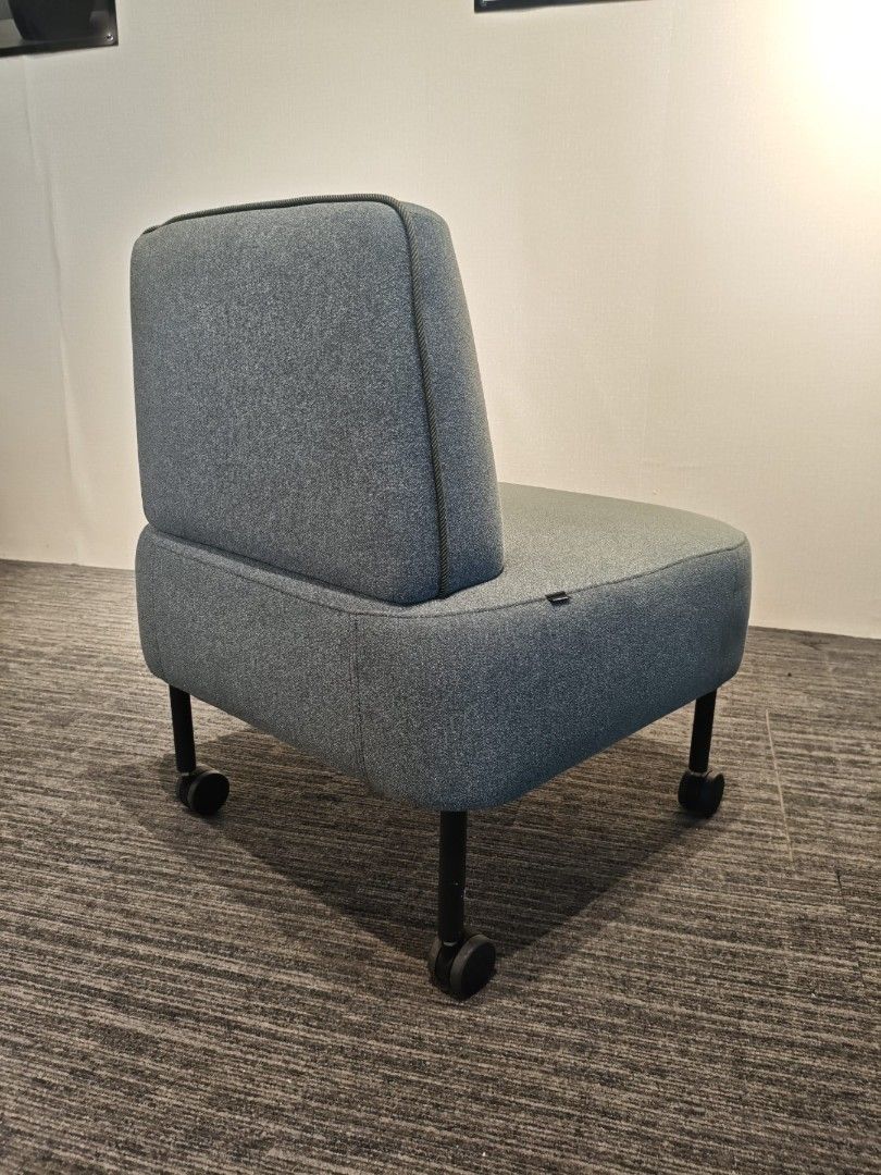 Okamura rolling lounge chair grey fabric (Category: Chairs) located in Quezon City. Submitted by kevinmacabata12997160 (Listing ID 1464826227, Image 3). Description: - Authentic Okamura grey fabric lounge chair - Thick cushioned seat for all-day comfort - Compact backrest with stylish dark piping trim - Black metal legs equipped with smooth-rolling caster wheels - Modern minimalist design, perfect for home office or study - Clean upholstery, well
