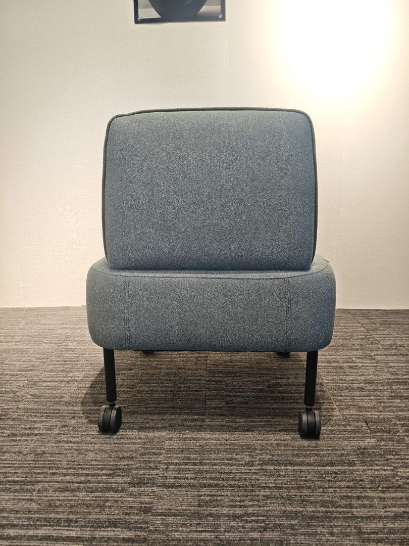 Okamura rolling lounge chair grey fabric (Category: Chairs) located in Quezon City. Submitted by kevinmacabata12997160 (Listing ID 1464826227, Image 2). Description: - Authentic Okamura grey fabric lounge chair - Thick cushioned seat for all-day comfort - Compact backrest with stylish dark piping trim - Black metal legs equipped with smooth-rolling caster wheels - Modern minimalist design, perfect for home office or study - Clean upholstery, well