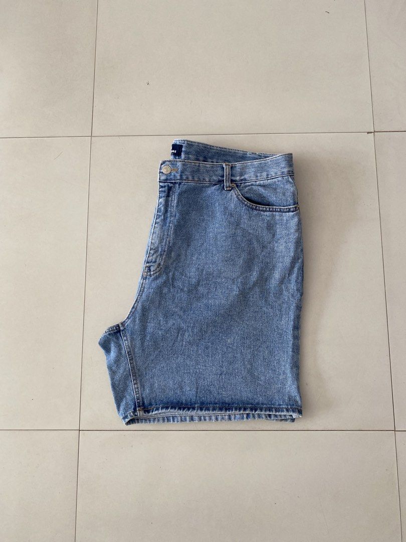 Okkane Blue Denim Shorts (Category: Shorts) located in San Carlos City. Submitted by soy_closet20s. (Listing ID 1464887627, Image 3). Description: - Brand: Okkane - Item: Blue denim shorts - Wash: Classic mid-wash finish - Features: Standard front and back pockets, belt loops, button and zipper fly closure - Style: Casual everyday staple, easy to pair with tees or hoodies - Note: Measurements available upon request.