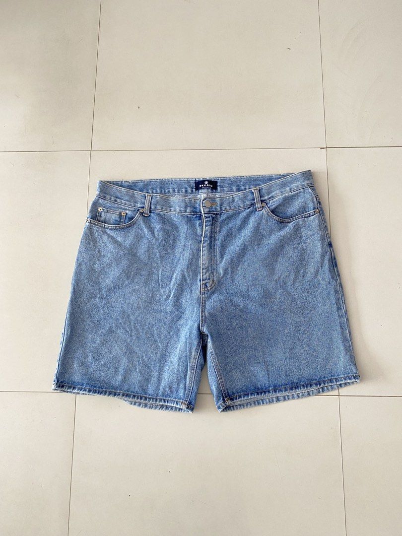 Okkane Blue Denim Shorts (Category: Shorts) located in San Carlos City. Submitted by soy_closet20s. (Listing ID 1464887627, Image 1). Description: - Brand: Okkane - Item: Blue denim shorts - Wash: Classic mid-wash finish - Features: Standard front and back pockets, belt loops, button and zipper fly closure - Style: Casual everyday staple, easy to pair with tees or hoodies - Note: Measurements available upon request.