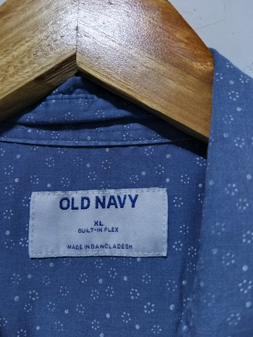 Old Navy Built-In Flex Shirt Size XL (Category: Shirts) located in Magdalena. Submitted by magdalenathrift20 (Listing ID 1464910254, Image 3). Description: - Brand: Old Navy - Size: XL (Width: 25", Length: 29.5") - Color/Design: Blue with all-over small white pattern - Material: Comfortable Built-In Flex fabric - Features: Short sleeves, front chest pocket, standard collar - Origin: Made in Bangladesh - Condition: Excellent/Ready to wear.