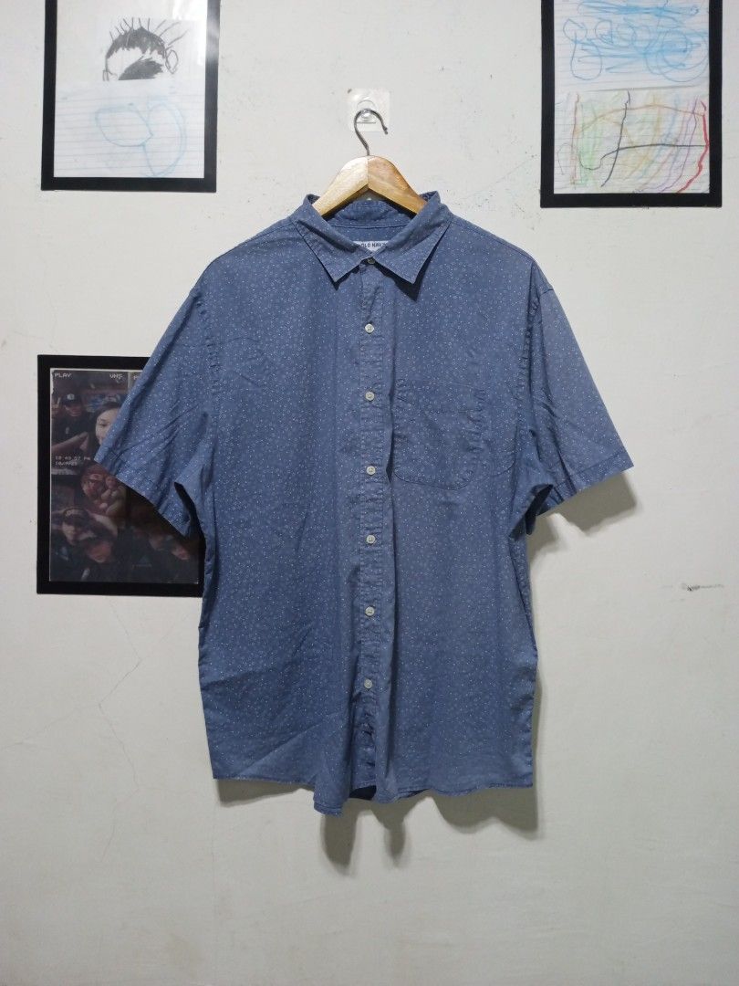 Old Navy Built-In Flex Shirt Size XL (Category: Shirts) located in Magdalena. Submitted by magdalenathrift20 (Listing ID 1464910254, Image 2). Description: - Brand: Old Navy - Size: XL (Width: 25", Length: 29.5") - Color/Design: Blue with all-over small white pattern - Material: Comfortable Built-In Flex fabric - Features: Short sleeves, front chest pocket, standard collar - Origin: Made in Bangladesh - Condition: Excellent/Ready to wear.