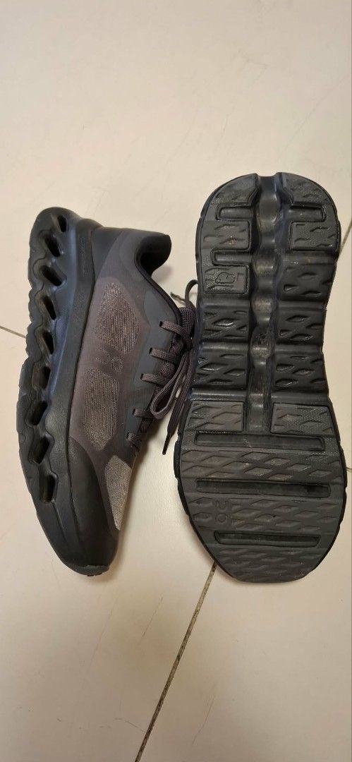 On Cloudtilt Remix Charcoal Black Sneakers (Category: Sneakers) located in Pasig City. Submitted by fryxz (Listing ID 1464881421, Image 2). Description: - Brand/Model: On Cloudtilt Remix - Color: Dark Charcoal Black - Upper: Breathable mesh with durable synthetic overlays - Sole: Distinctive hollowed-out design for superior cushioning - Closure: Standard lace-up - Outsole: Treaded for reliable daily traction - Ideal for: Lightweight running, walk
