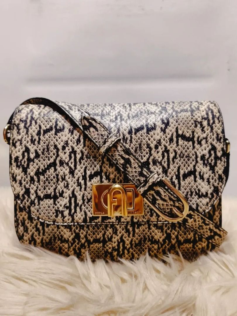 Original FURLA Snake skin (Category: Shoulder Bags) located in Cabuyao City. Submitted by your____lux____shop (Listing ID 1464793550, Image 1). Description: Sale❗️Sale❗️Sale❗️ ₱ 3,899 Original FURLA Small Pure genuine snake skin 📌First to pay!.