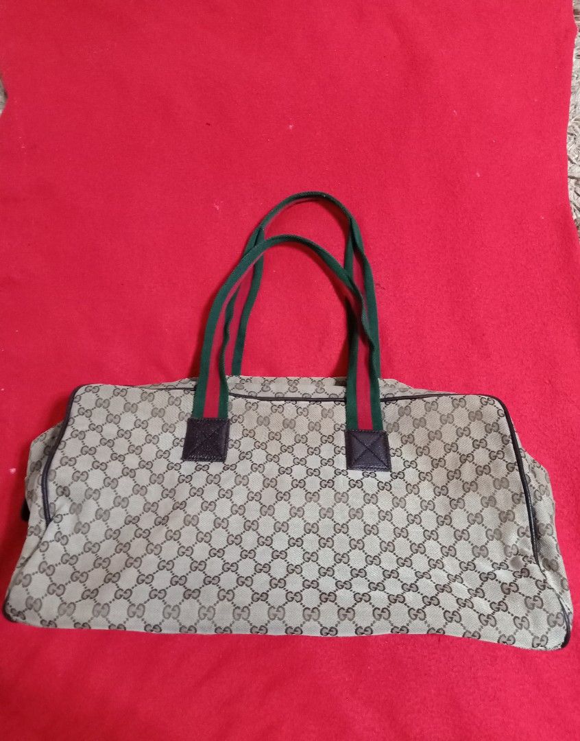 Original gucci monogram duffle bag (Category: Tote Bags) located in Binmaley. Submitted by fashionluxury058 (Listing ID 1464948173, Image 3). Description: original gucci monogram duffle bag in good condition size: large unisex.