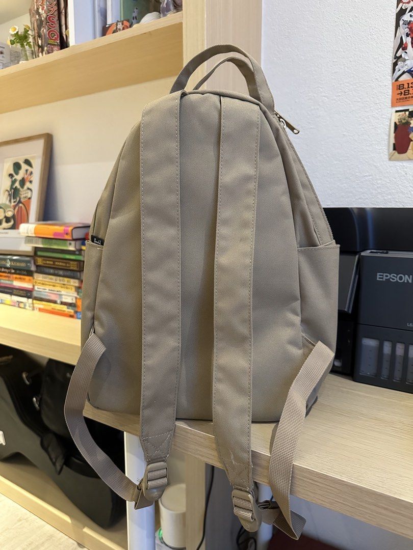 ORIGINAL Herschel Supply Co. Backpack - Olive Green (Category: Backpacks) located in Quezon City. Submitted by mars_f (Listing ID 1464859719, Image 2). Description: Color may appear different due to indoor lighting. Only used twice! Still sturdy and bought from a different country. - Classic Design - Front zip pocket - Spacious main compartment with pocket inside - Side pockets - Signature red and white stripe lining - Adjustable shoulder straps.