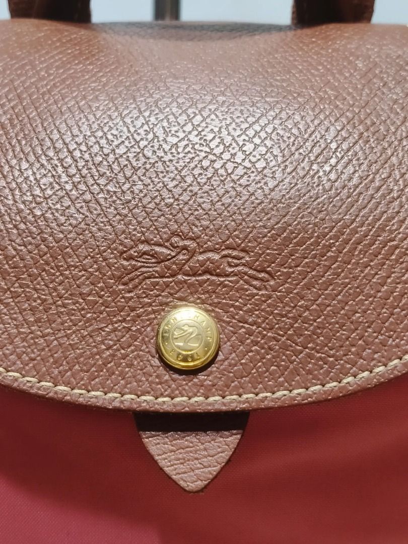 Original LONGCHAMP Backpack (Category: Shoulder Bags) located in Cabuyao City. Submitted by your____lux____shop (Listing ID 1464797176, Image 3). Description: Sale❗️Sale❗️Sale❗️ ₱ 1,980 Original LONGCHAMP Preloved Medium ykk zipper Nylon & Genuine leather trim 📌First to pay!.