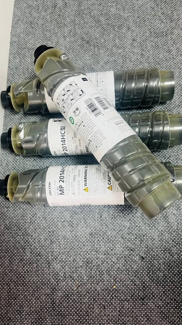 Original RICOH MP2014 Toner Cartridge (Category: Printers, Scanners & Copiers) located in Quezon City. Submitted by copieronlineinc (Listing ID 1464861002, Image 2). Description: 🖨️ ORIGINAL RICOH MP2014HC TONER CARTRIDGE 📌 Model: MP 2014HC Color: Black Toner Weight: 390g Price: ₱4,500 / pc 🖨️ COMPATIBLE WITH: ✅ Ricoh MP 2014/2014D/2014AD ✅ Ricoh M 2700/2701, IM 2702 ⚙️ Used for: Black printing and copying on compatible Ricoh machines. ✅ Helps