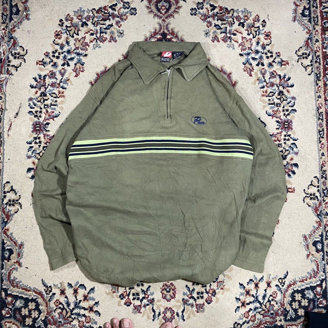 Paco Vintage Green Quarter Zip Pullover Sweatshirt (Category: Coats, Jackets and Outerwear) located in Manila. Submitted by thrifturfit_star (Listing ID 1464943036, Image 1). Description: - Brand: Paco - Style: Quarter-zip sweatshirt with metal zipper pull and relaxed fit - Color: Olive green with lime and dark navy chest stripes - Details: Small embroidered logo on upper right chest and long sleeves - Condition/Use: Great for daily wear during c