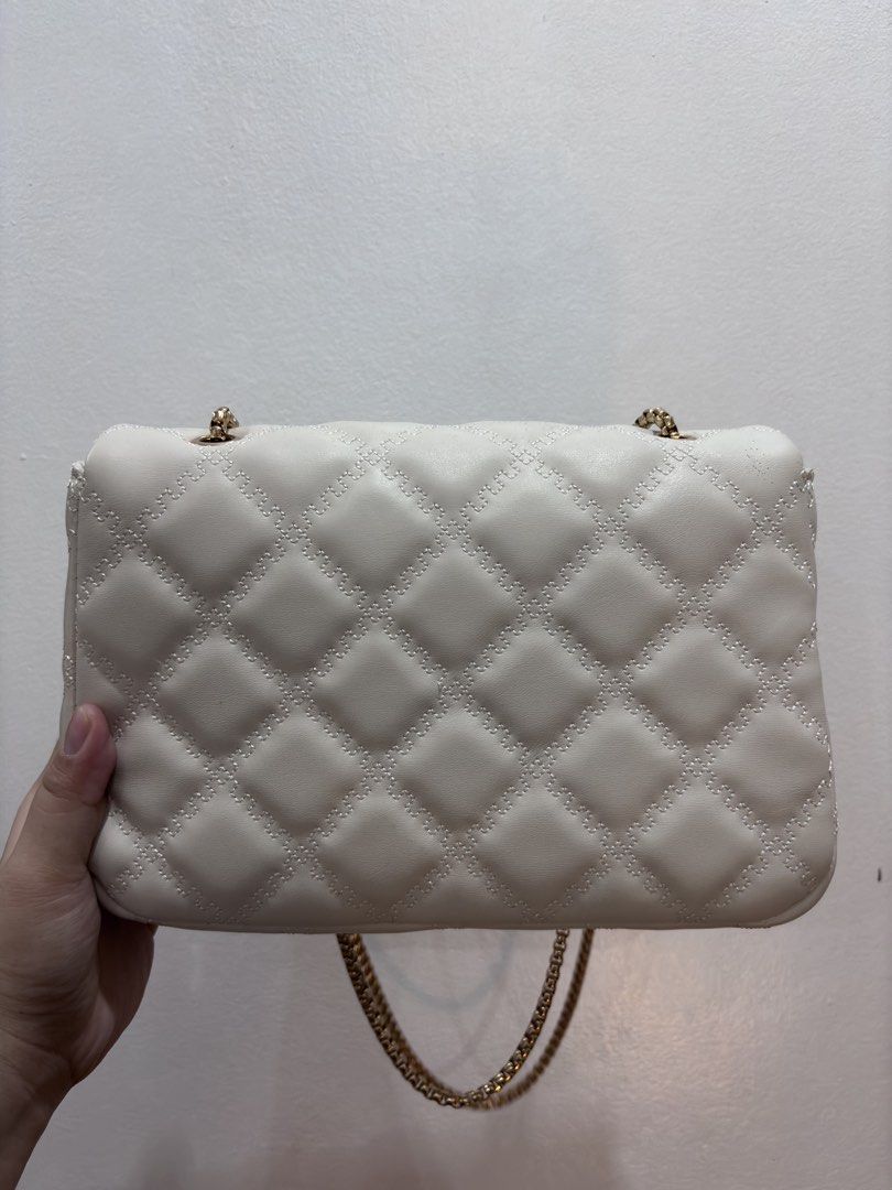 Parisian White Shoulder Bag (Category: Shoulder Bags) located in Manila. Submitted by niellaeun (Listing ID 1464778768, Image 2). Description: Original Price: 700 Used once, during grad only Excellent Condition .
