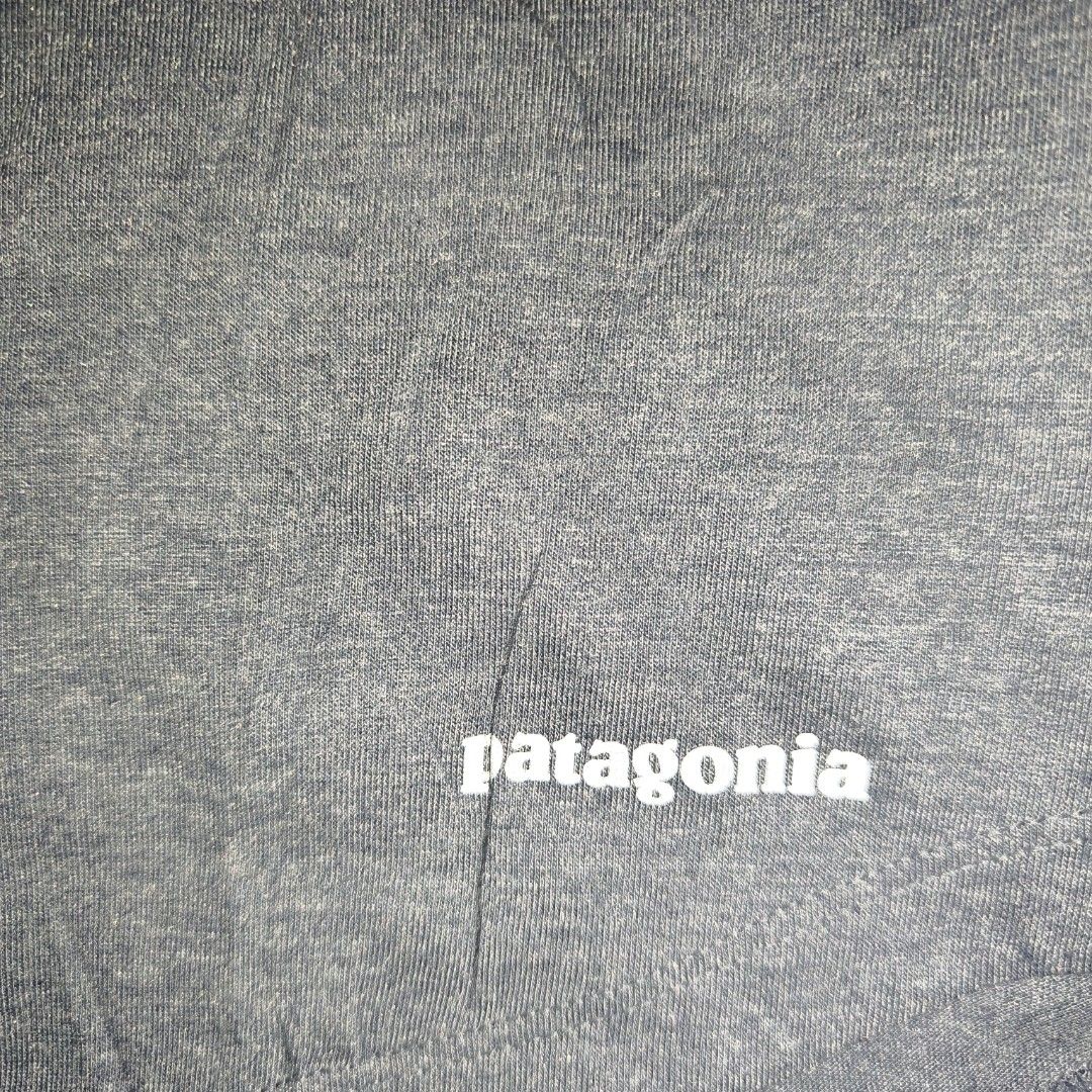 Patagonia Women's (Category: Shirts) located in Antipolo. Submitted by alphaomega_fox (Listing ID 1464890294, Image 3). Description: - Brand: Patagonia - Style: Athletic t-shirt with scoop neck - Color: Heather blue with lime green inner collar trim - Size: XS 17x25 - Material: 100% polyester - Details: Small white Patagonia logo near front hem, Worn Wear tag inside - Condition: excellent condition 250 plus sf.