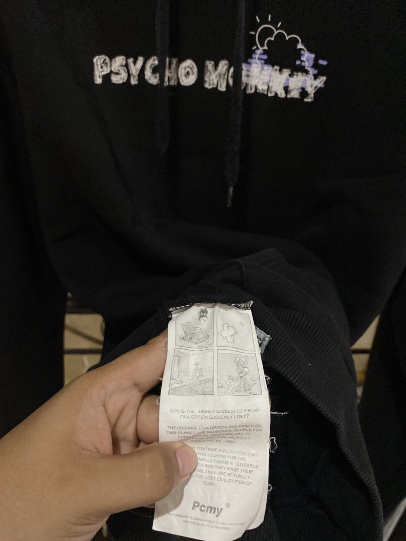 Pcmy Lab Psycho Monkey Black Hoodie Size M (Category: Coats, Jackets and Outerwear) located in Rizal. Submitted by channzy (Listing ID 1464920525, Image 3). Description: - Brand: Pcmy Lab - Color: Black - Size: Medium (M tag on blue neck label) - Design: Striking Psycho Monkey graphics on front and back - Material: Premium heavy cotton with printed details - Features: Hood drawstrings plus signature Pcmy Lab logo tags on the front hem and sleeve 