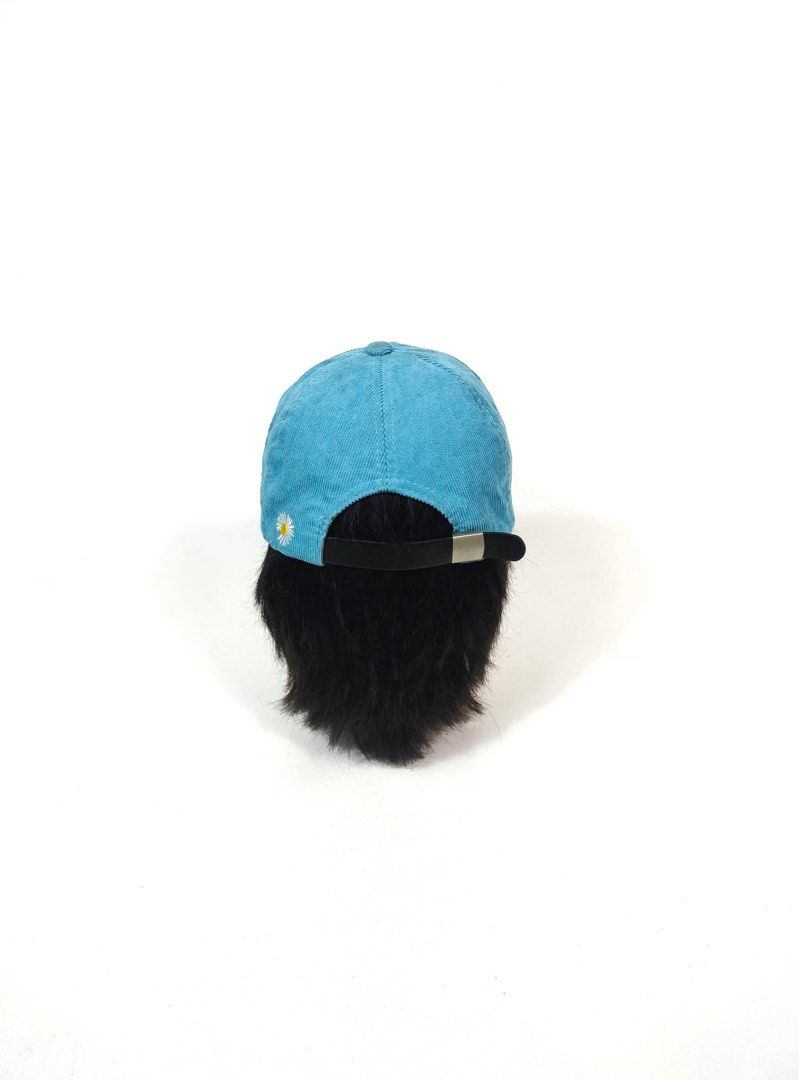 Peace minus one cap (Category: Caps & Hats) located in Manila. Submitted by yesterdaysfinds (Listing ID 1464864337, Image 3). Description: - Color & Material: Light blue textured corduroy - Front Design: White embroidered leaf details and a circular red-lettered patch - Brim Detail: Stylish red braided cord across the brim - Back Detail: Cute embroidered white and yellow daisy - Fit: Adjustable back strap with a black band and metal clasp - Style