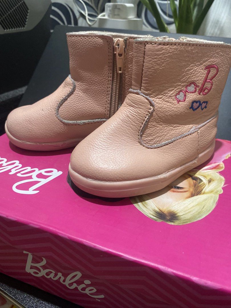 Pebbles Pink Boots Size 5 (Category: Babies & Kids Fashion) located in Manila. Submitted by chingsenallertse (Listing ID 1464894344, Image 2). Description: - Brand: Pebbles - Size: 5 - Material: Pink leather style - Closure: Side zipper for easy wear - Design: Embroidered Barbie logo and heart graphics - Comfort: Soft lining inside - Condition: Brand new / Excellent.