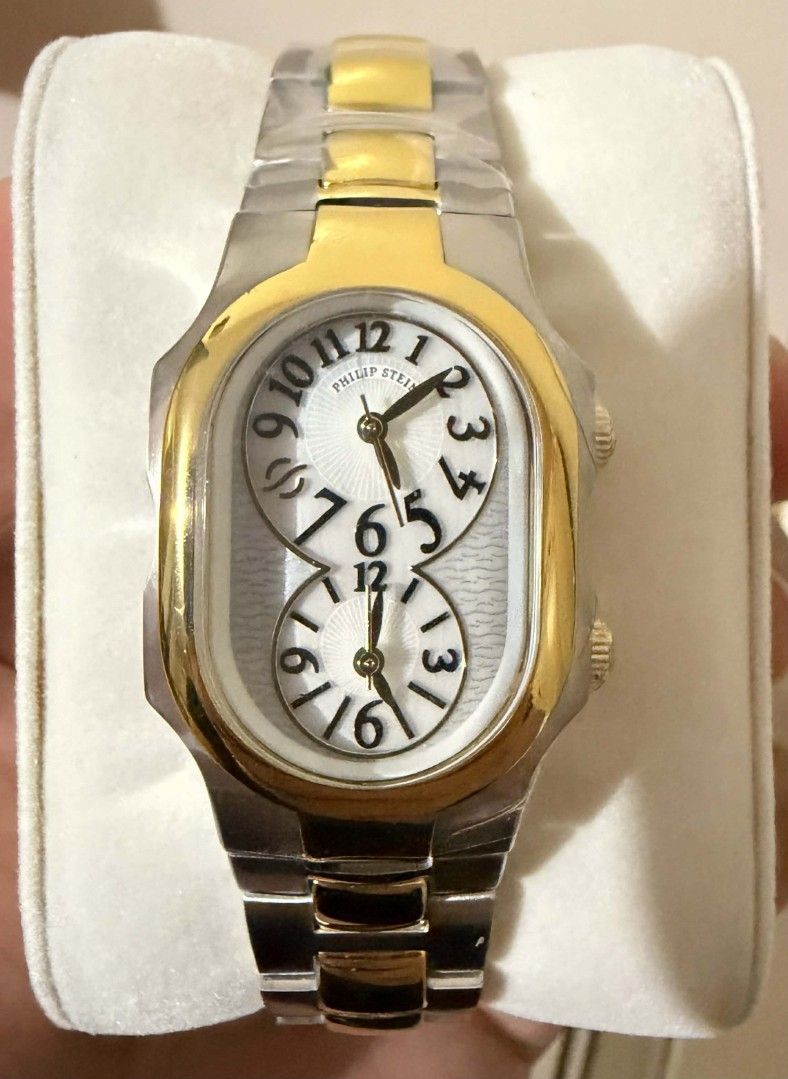 Philip Stein Dual Time Two-Tone Watch (Category: Women's Watches) located in Manila. Submitted by hansiekun (Listing ID 1464925719, Image 3). Description: SELLING WATCH‼️ PHILIP STEIN SIGNATURE WHT GOLD L Never been used or worn You can check it before you pay. Meet up around Pasig Selling it for only : 38k.