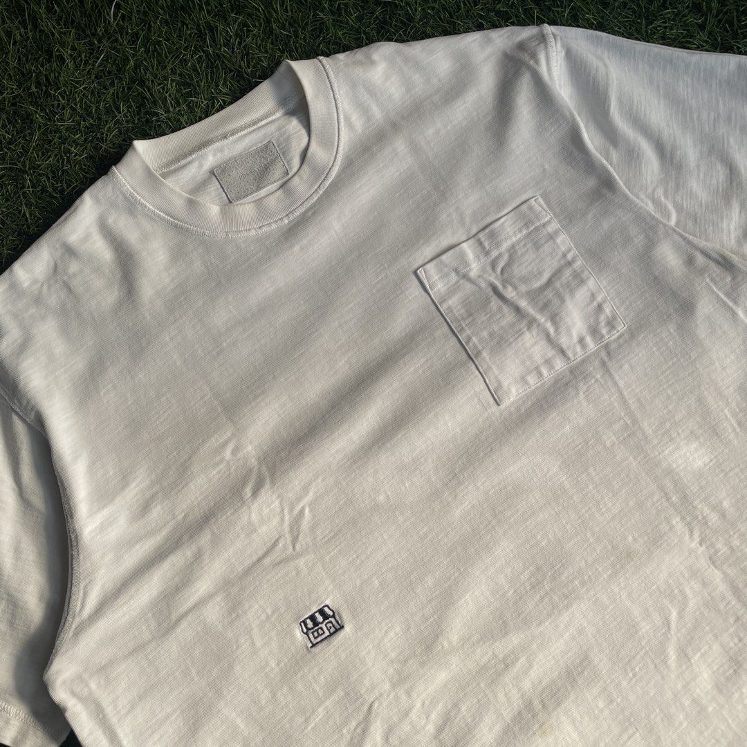 Pin SkTBS Pocket Tee (Category: Tshirts & Polo Shirts ) located in Pasig City. Submitted by icie_finds (Listing ID 1464877996, Image 2). Description: Pin SkTBS Pocket Tee SIZE: Fits Large (Tagged L) DIMES: Width: 27 inches Length: 28 inches Model: Pin SkTBS Casual Pocket T-Shirt Style: Relaxed fit short-sleeve tee featuring a classic crewneck collar, single left chest pocket, textured slub cotton fabric, and a small embroidered storefront graphic