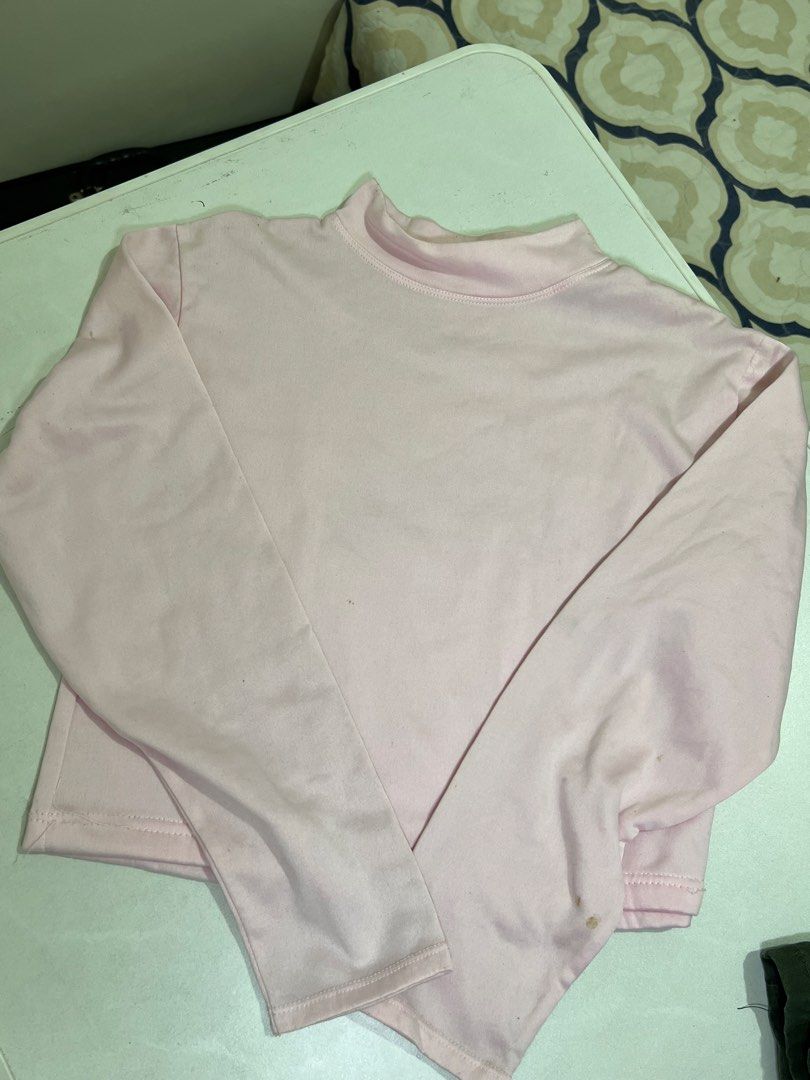 Pink Long Sleeve Mock Neck Crop Top (Category: Longsleeves) located in Manila. Submitted by sennisen (Listing ID 1464922367, Image 1). Description: - Color: Soft pink - Style: Long sleeve top with mock neckline - Fit: Cropped fit with clean hems - Fabric: Stretchy, comfortable material - Versatility: Perfect casual basic, easy to pair with high-waisted jeans or skirts for daily wear.
