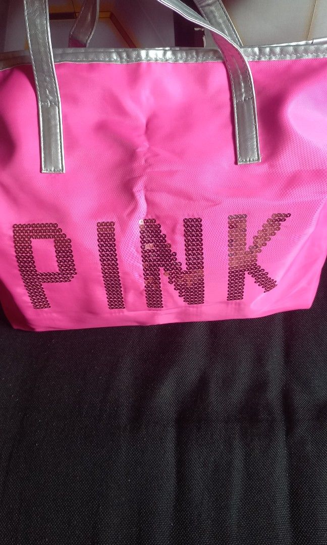 Pink Sequin Tote Bag (Category: Tote Bags) located in Valenzuela. Submitted by cc850906 (Listing ID 1462930337, Image 1). Description: - Eye-catching bright pink tote bag - Features sparkly 'PINK' sequin letters - Sturdy silver handles - Ample space for essentials or gym gear - Fun and vibrant design.