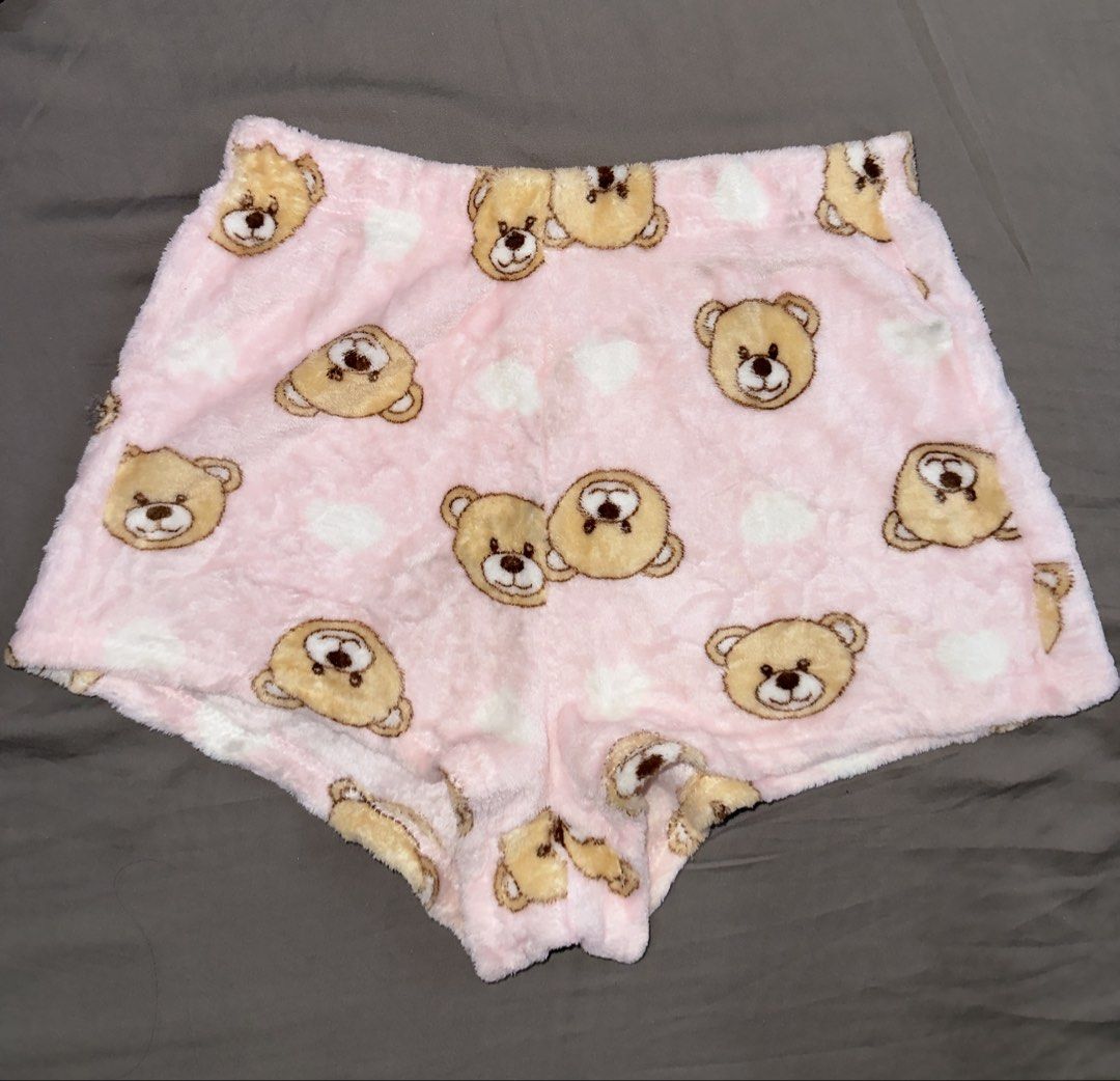 Pink Teddy Bear Fluffy Sleep Shorts (Category: Undergarments & Loungewear) located in Santa Ana. Submitted by fatikilla (Listing ID 1464820691, Image 1). Description: - Super soft and fuzzy baby pink material - Cute teddy bear and white heart prints - Size S with a comfortable elastic waistband - 95% polyester and 5% elastane for a cozy stretch - Perfect for lounging or sleeping at home.
