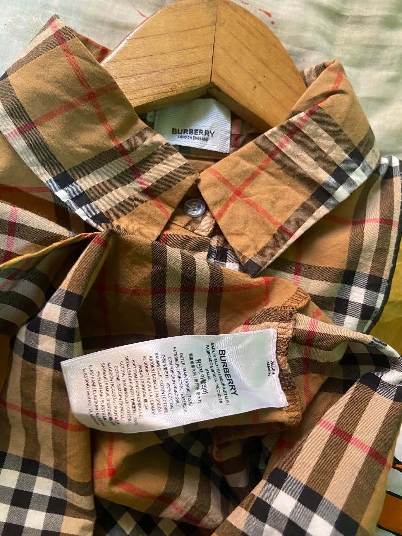 PLAID Burberry button down longsleeves UNISEX (Category: Coats, Jackets and Outerwear) located in Alaminos. Submitted by stafits4youuu (Listing ID 1464807685, Image 2). Description: 22 x 29 best fit large to XL LIKE NEW CONDITION NO ISSUE.