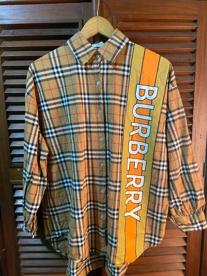 PLAID Burberry button down longsleeves UNISEX (Category: Coats, Jackets and Outerwear) located in Alaminos. Submitted by stafits4youuu (Listing ID 1464807685, Image 1). Description: 22 x 29 best fit large to XL LIKE NEW CONDITION NO ISSUE.
