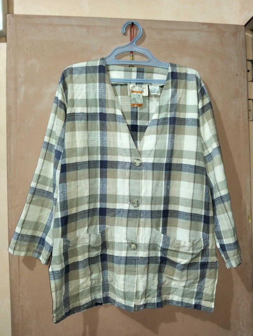 Plaid Button-Up Cardigan with Pockets (Category: Coats, Jackets and Outerwear) located in Caloocan City. Submitted by girlshopmcollection (Listing ID 1464941359, Image 1). Description: - Color: Green and navy blue plaid - Style: Relaxed fit V-neck cardigan - Details: Three front buttons and two front patch pockets - Sleeves: Long sleeves - Material: Lightweight cotton blend - Condition: Great for everyday layering *** *** Price per piece.