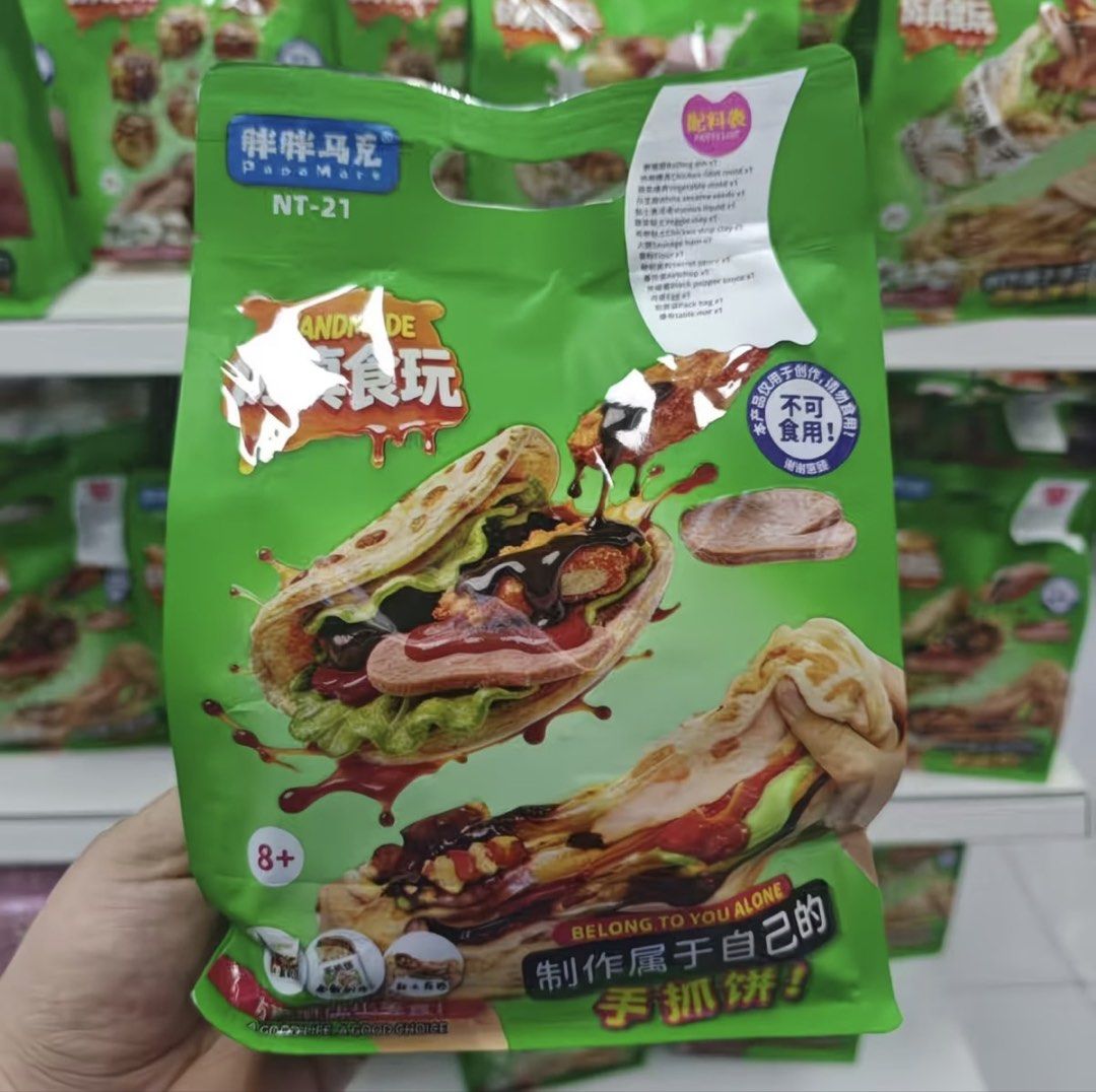 Zuru Slime Mart Like (Category: Kids Toys) located in Quezon City. Submitted by polygon22 (Listing ID 1464846675, Image 2). Description: - Item: Handmade Food Decompression Toy Kits - Available Styles: Takoyaki, Jianbing, Burger, and Ice Cream Swirl - Features: Create your own custom squishy food models using included molds and materials - Recommended Age: Suitable for ages 8 and up - Ideal For: Creative kids, DIY craft activities, and stress rel