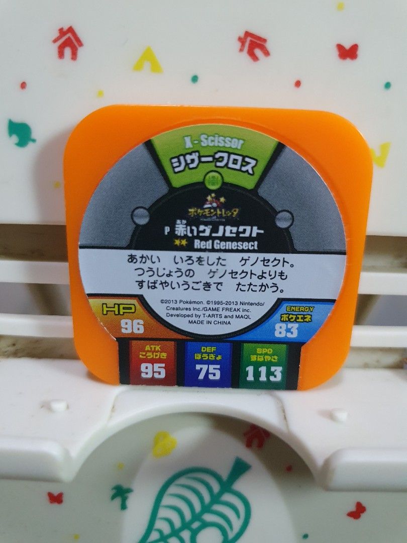 Pokemon Tretta promo Chip Red Genesect (Category: Character Goods) located in Quezon City. Submitted by collectionneursonline88 (Listing ID 1464957831, Image 2). Description: - Official Pokémon Tretta token: Red Genesect (Energy 83) - Stats: HP 96, ATK 95, DEF 75, SPD 113 - Signature Move: X-Scissor - Authentic merchandise by Nintendo, Creatures, Game Freak, T-ARTS, and MAQL for collection only .Japan version not usable in Philippines arcade mach
