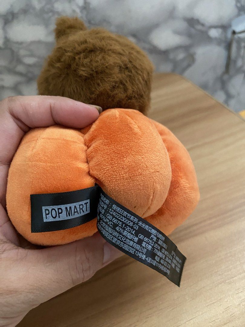 POP MART THE MONSTERS Pumpkin Plush Pendant (Category: Plushies & Soft Toys) located in Caloocan City. Submitted by izzyjelly (Listing ID 1464863805, Image 3). Description: - Authentic Pop Mart The Monsters Halloween plush pendant - Adorable brown monster dressed in a cute pumpkin outfit - Features a tiny skull detail on the ear - Super soft and huggable plush material - Equipped with a sturdy key ring at the top - Comes with original fabric tags